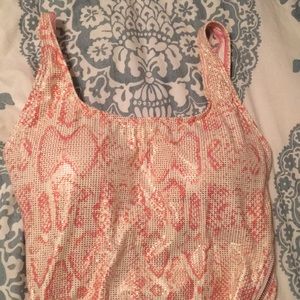 One piece swimsuit, new with tags. Size 8.